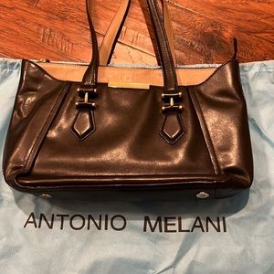 Antonio Melani Black leather purse with brown accents